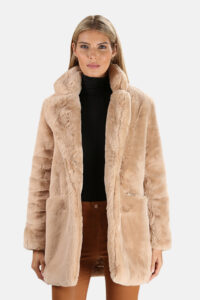 woman models apparis sophie faux fur coat