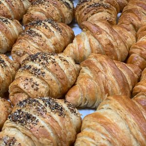 Plain croissants and croissants sprinkled with seeds