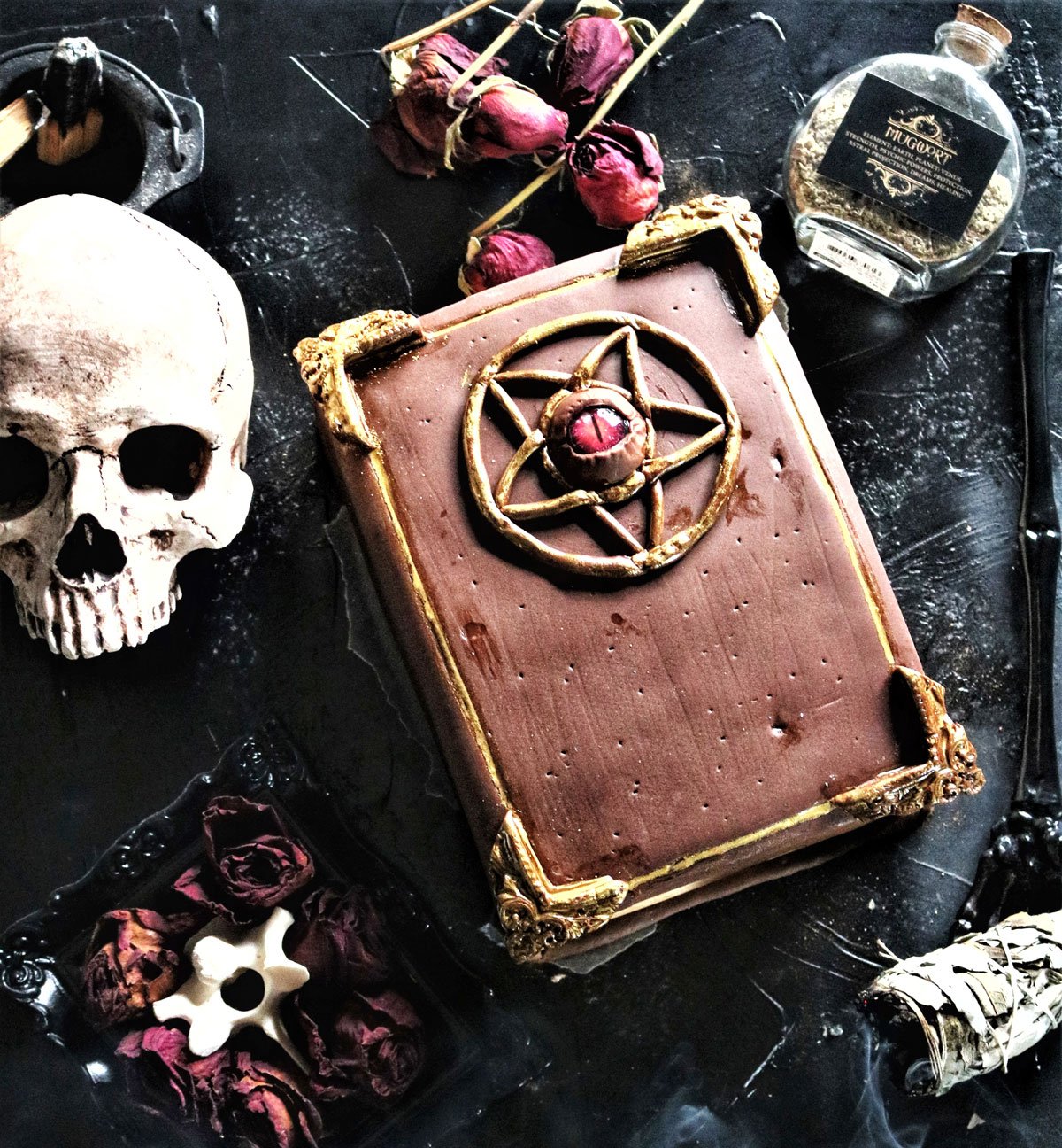 grimoire spell book vegan double dark chocolate cake skull potion dried flowers sage