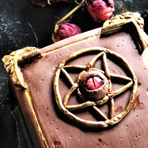 grimoire spell book vegan double dark chocolate cake closeup