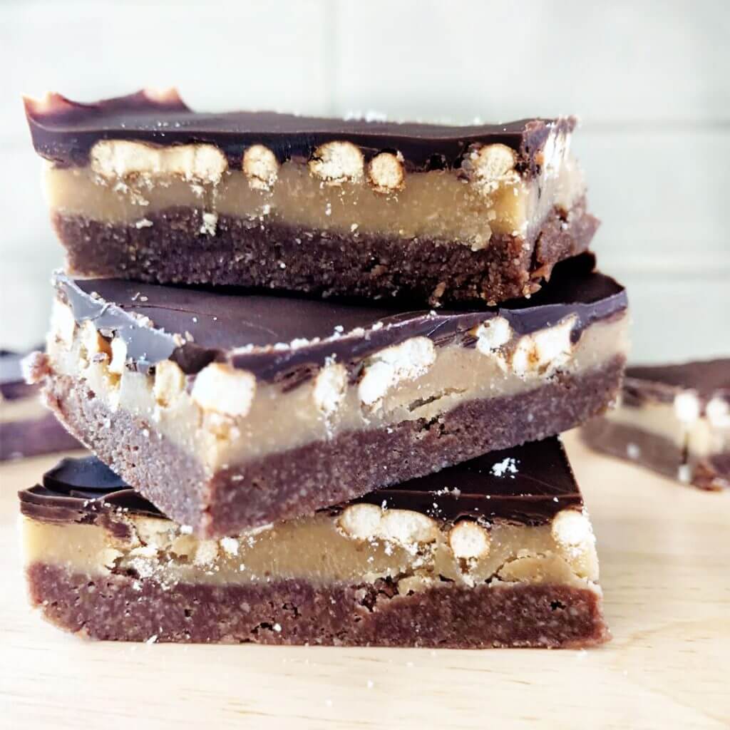 three stacked vegan pretzel millionaire bars