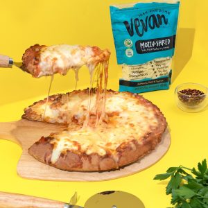 pizza pie with vevan foods shredded mozzarella vegan cheese