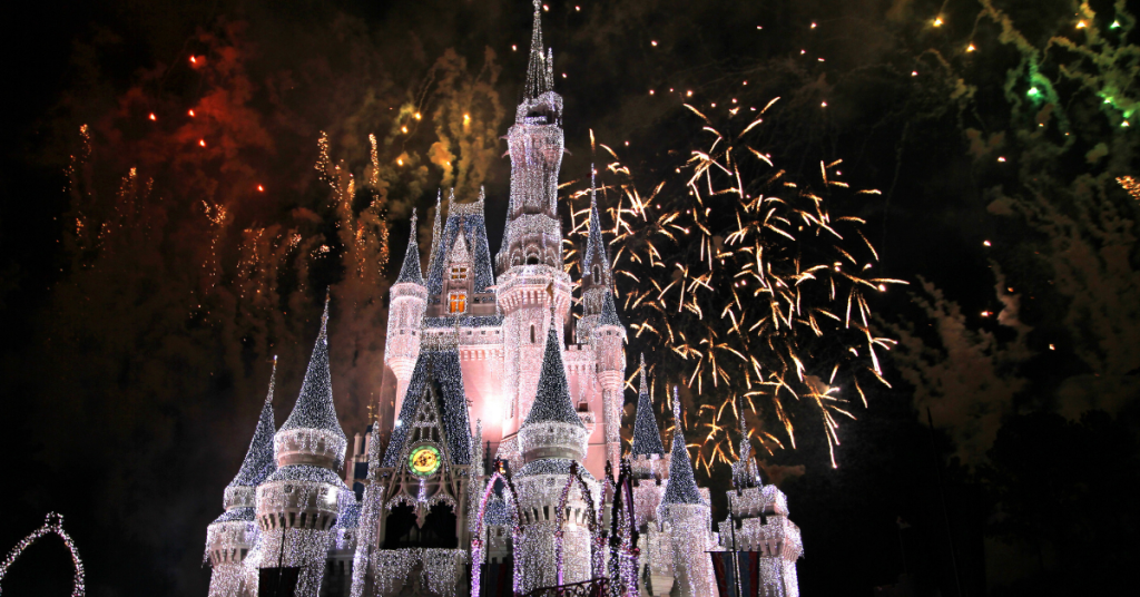 Disney Castle at night with fireworks