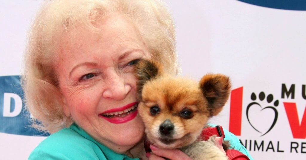 betty white holding dog