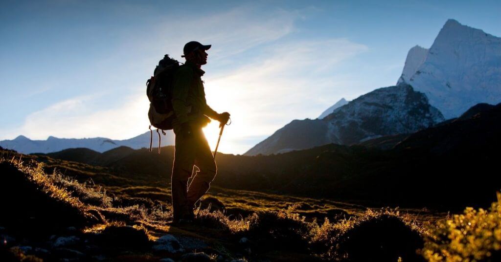 man hiking in mountains