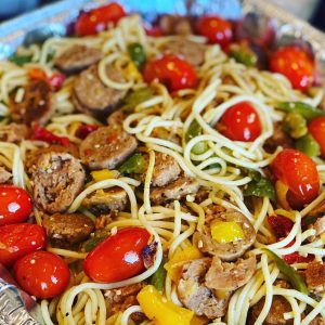 spaghetti with vegan sausage cherry tomatoes and peppers