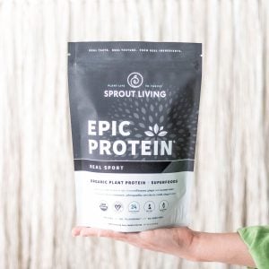 Hand Holding Package of Sprout Living Epic Protein