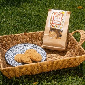 woven basket holding plate of uncle eddies vegan cookies