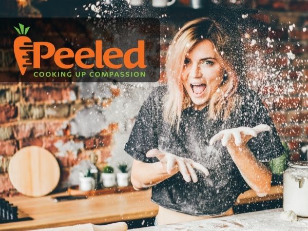 Lady throwing up flour in the air with peeled logo