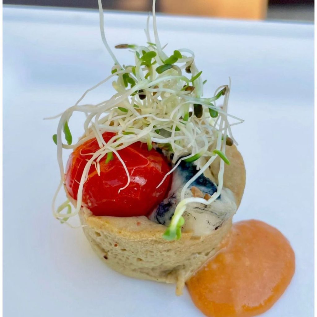 Cherry Tomato and Vegan Chèvre Clafoutis with Tomato Bisque and Alfalfa Sprouts