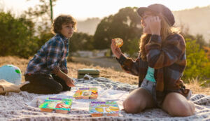 teen picnic vegnables pizza at park