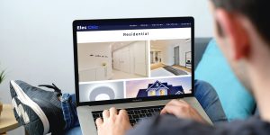 Man browsing website on laptop