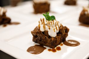 Bread Pudding with whipped cream and mint topping