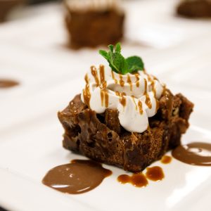 Bread Pudding with whipped cream and mint topping